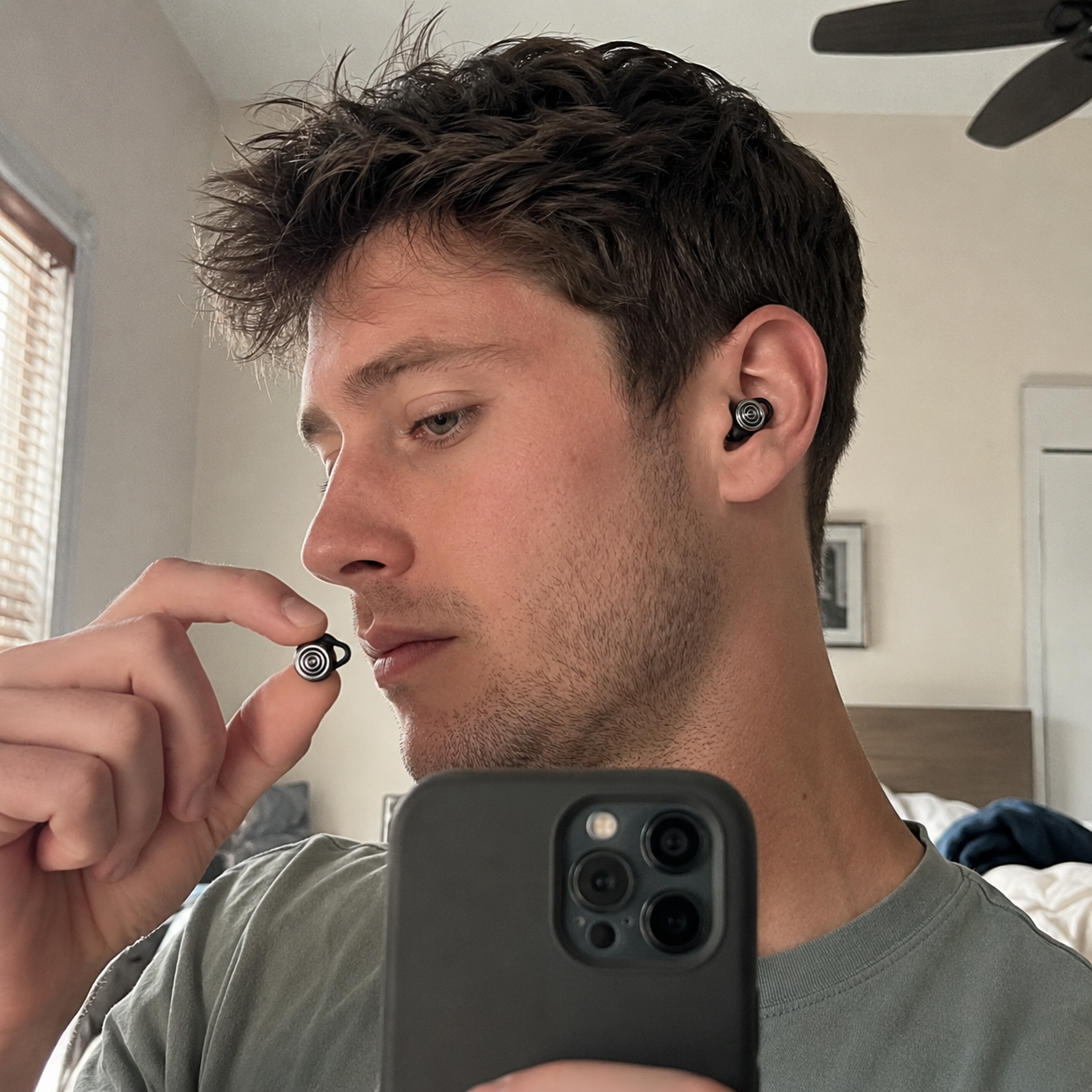 Customer holding a Driftwell earplug
