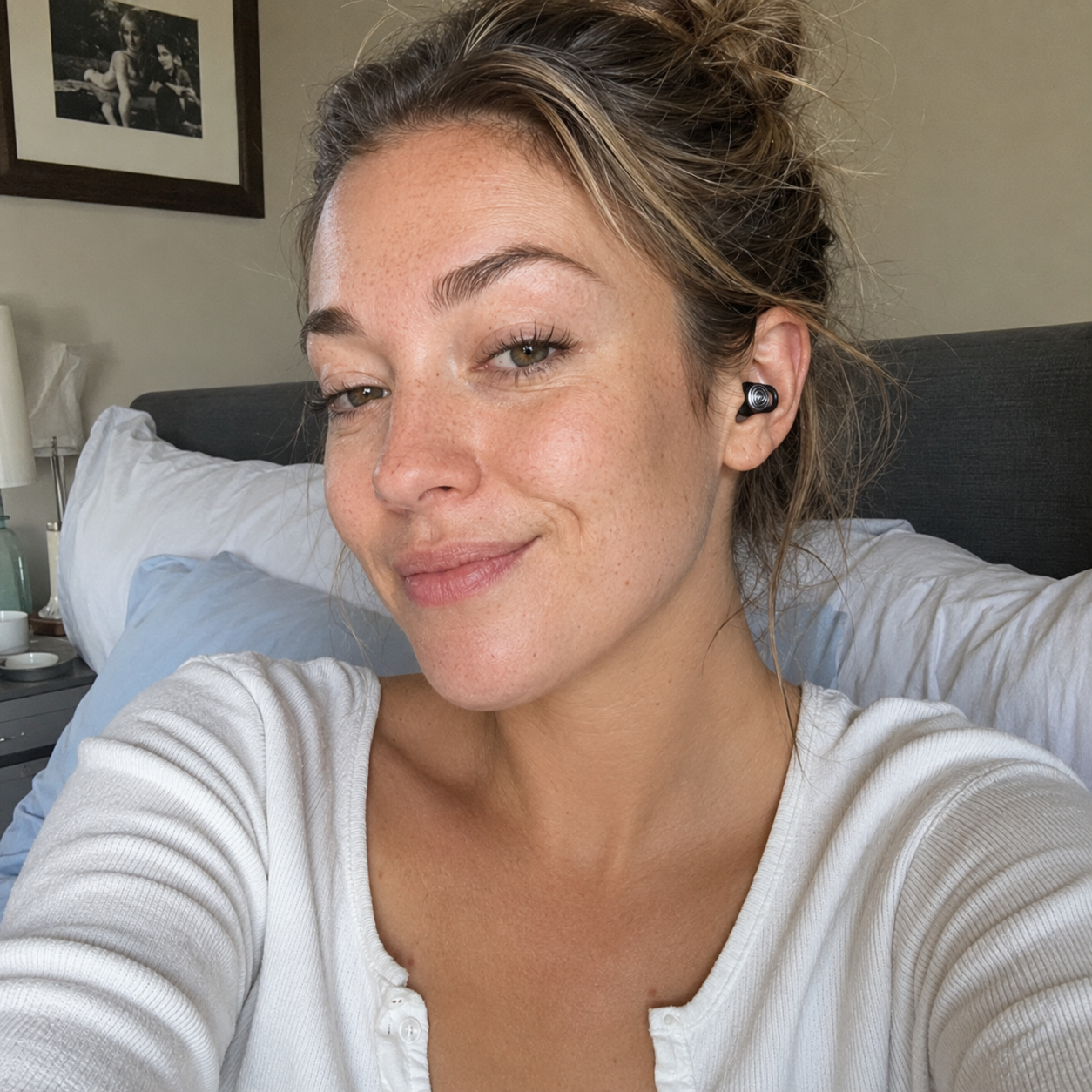 Customer wearing Driftwell earplugs in the bedroom