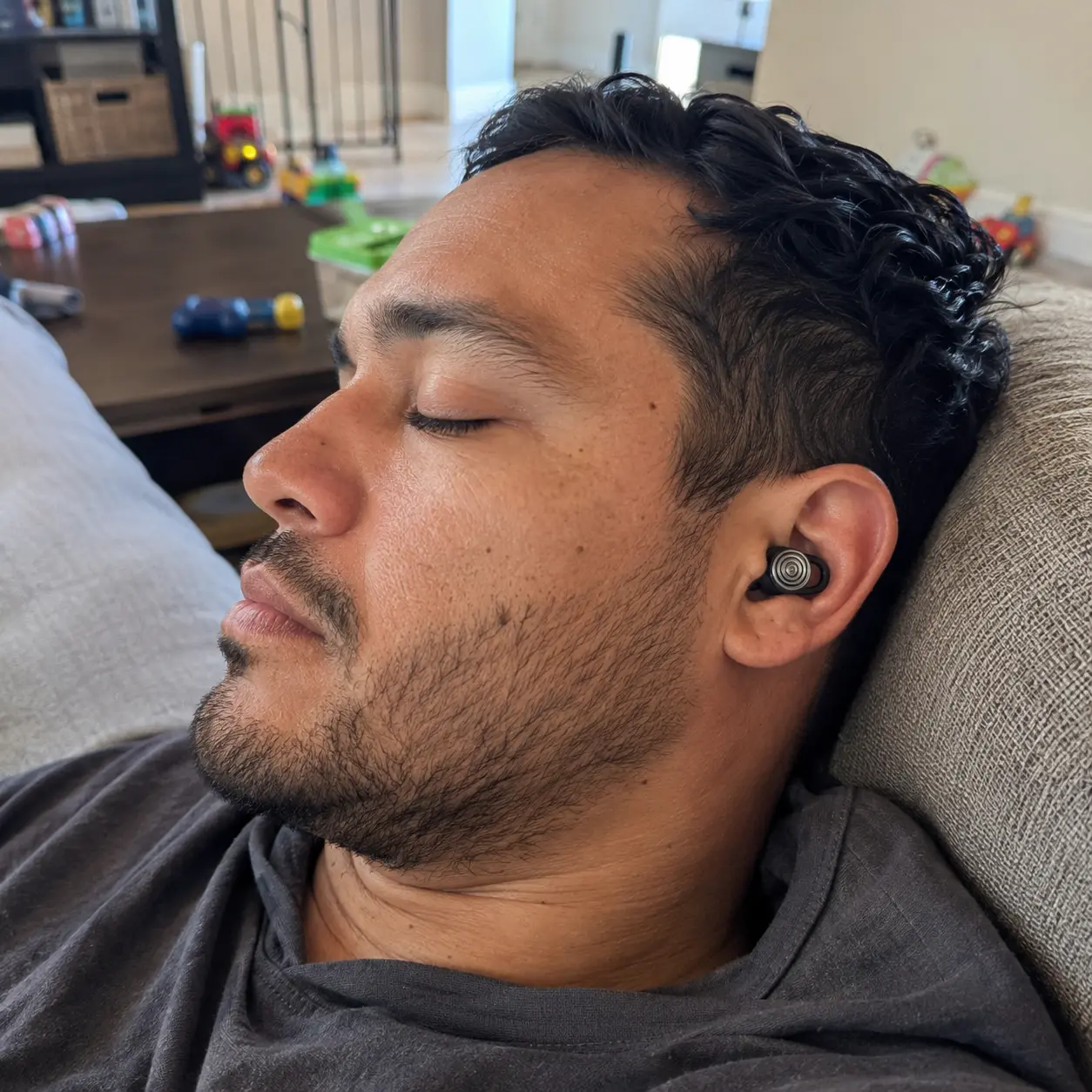Customer resting comfortably with a Driftwell earplug