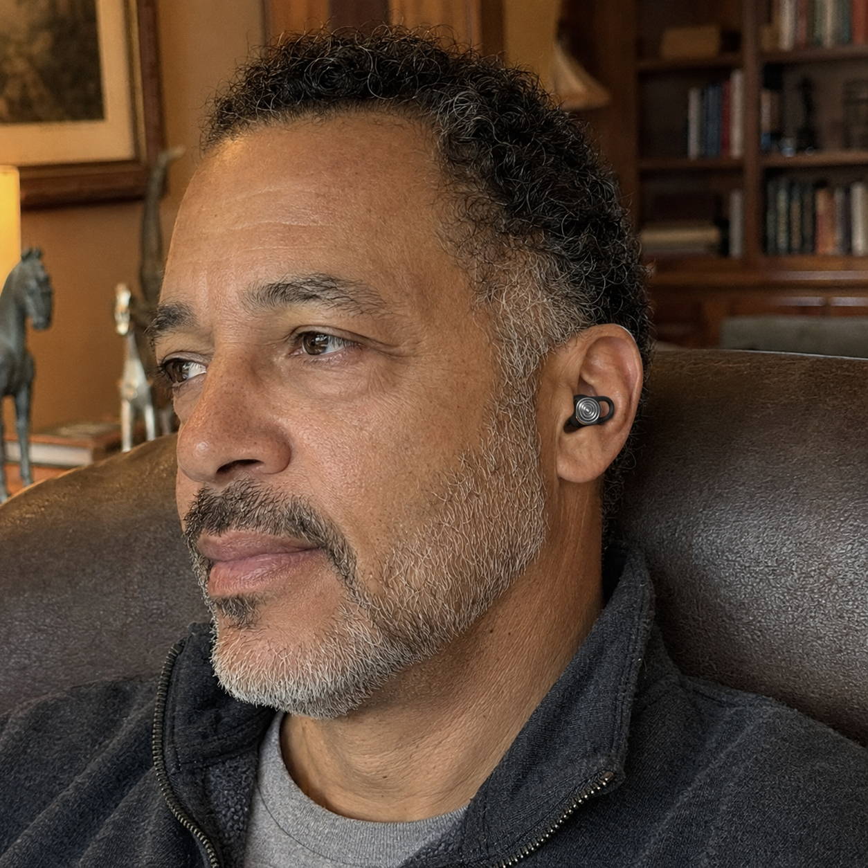Customer wearing Driftwell earplugs at home